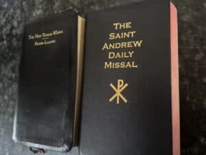 Another view comparing the thickness of the two daily missals